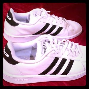 Adidas dress/tennis shoes.